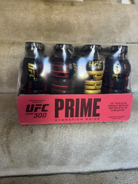 Estuche de hidratación UFC 300 Prime de 12 - 500 ml losa sellada edición limitada en mano