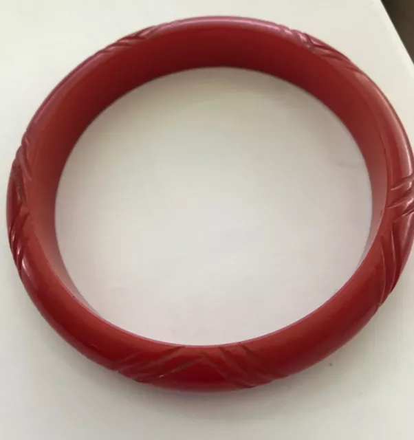 Vintage carved cherry red Bakelite bracelet/bangle