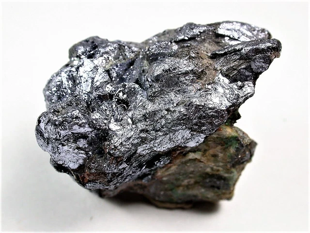 Minerals : Silvery Intergrown Molybdenite Xtls On Matrix, Teniente Mine In Chile Minerals : Silvery Intergrown Molybdenite Xtls On Matrix, Teniente Mine In Chile
