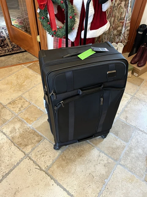 Tumi 139686-1041 30" 19 Degree 4 Wheel expandable Suitcase extended trip - Black