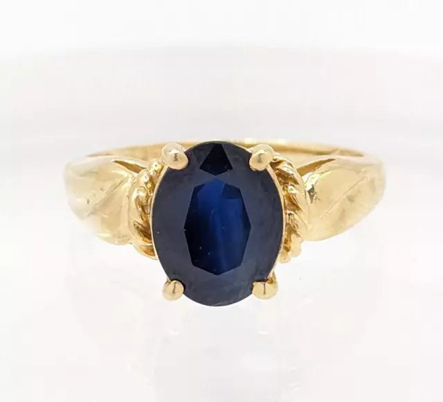 14K 2.6g Yellow Gold Blue Oval Sapphire Solitaire Ornate Swirl Shank Ring Size-5