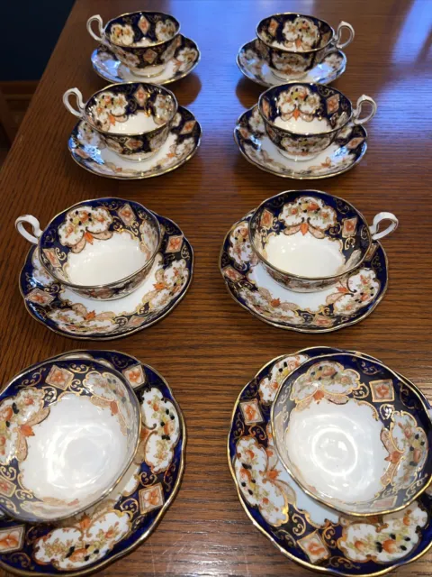 Royal Albert “Heirloom”  Footed Cup &saucer Bone China Made in England Set Of 8