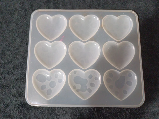 Molde de chocolate, vela y riego para corazón