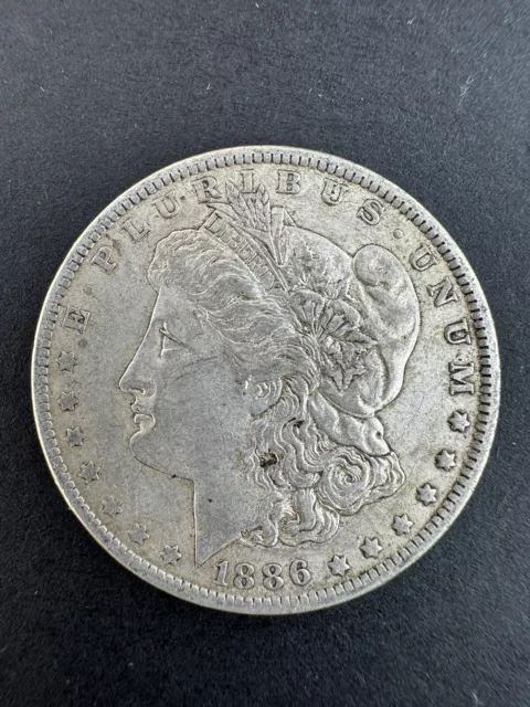 1886-O Semi Key Morgan Silver Dollar in XF - AU Condition