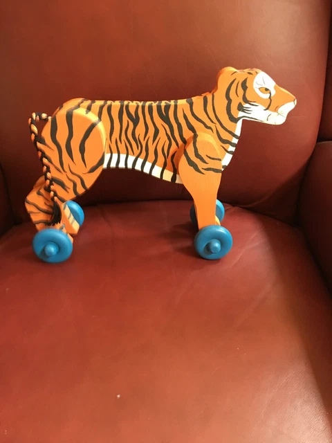Hand Made And Painted Orange Wooden Tiger Toy With Functional Blue Wheels