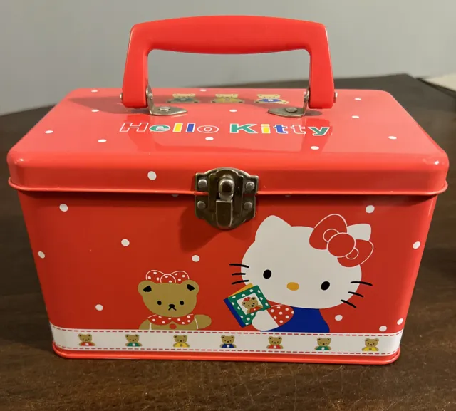 https://www.picclickimg.com/bL0AAOSwi1RlBmjc/Hello-Kitty-Metal-Tin-Lunchbox-Trinket-Box-Sanrio.webp