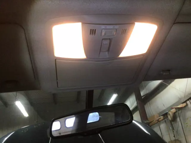 Used Front Upper Center Console fits: 2011 Nissan Rogue roof w/navigation system