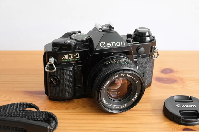 CANON AE1 PROGRAM Black Film Camera & 50mm f/1.8 Lens $438.05