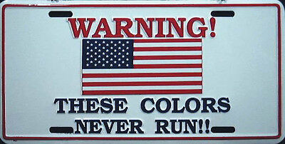 WARNING These Colors Never Run!! - Metal Novelty License Plate Sign
