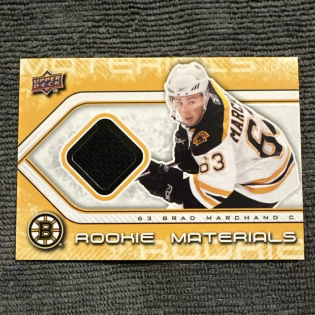 Brad Marchand 2009-10 Upper Deck Rookie Worn Materials RC Boston Bruins Captain