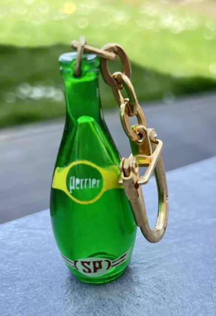 Porte clés miniature bouteille de PERRIER neuve , sous blister.