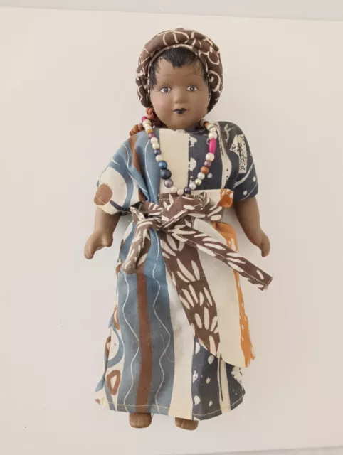 porcelain doll in nigerian  costume bambola da collezione in costume  nigeriano