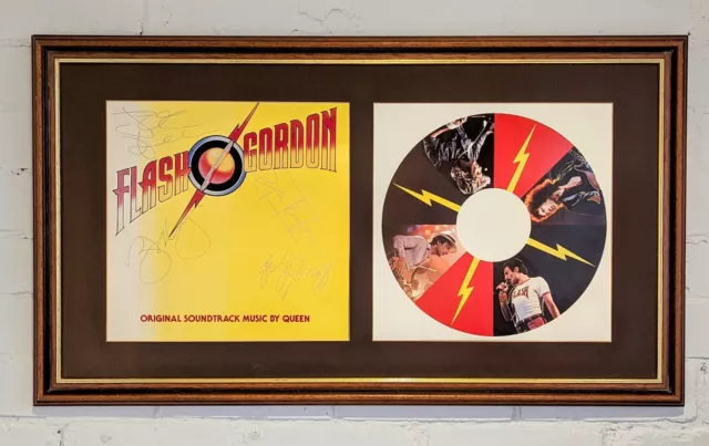 Queen Fully Hand Signed Flash Gordon Album Cover.  Framed With Certificate.
