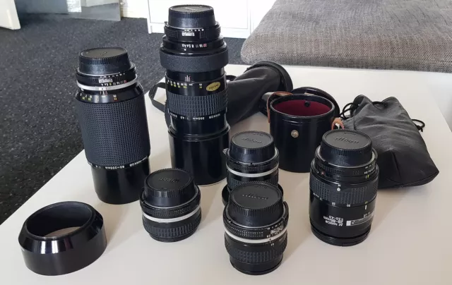 Verschiedene Nikon Objektive – analog, 4 Festbrennweiten und 2 Zoomobjektive