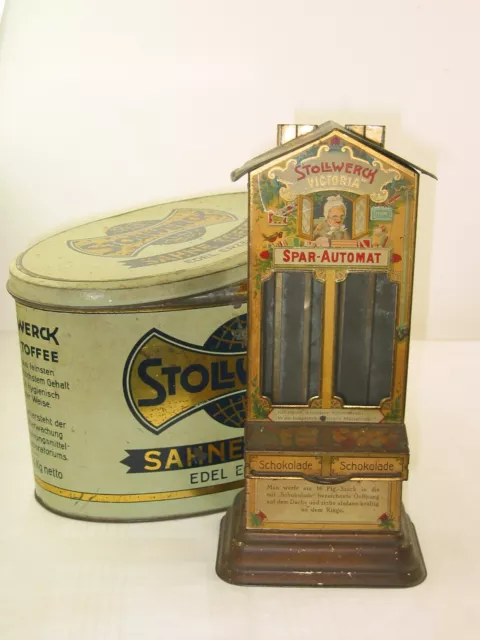 2 x Stollwerck Blechspielzeug Victoria Spar Automat um 1905 + Bonbon Dose Toffee