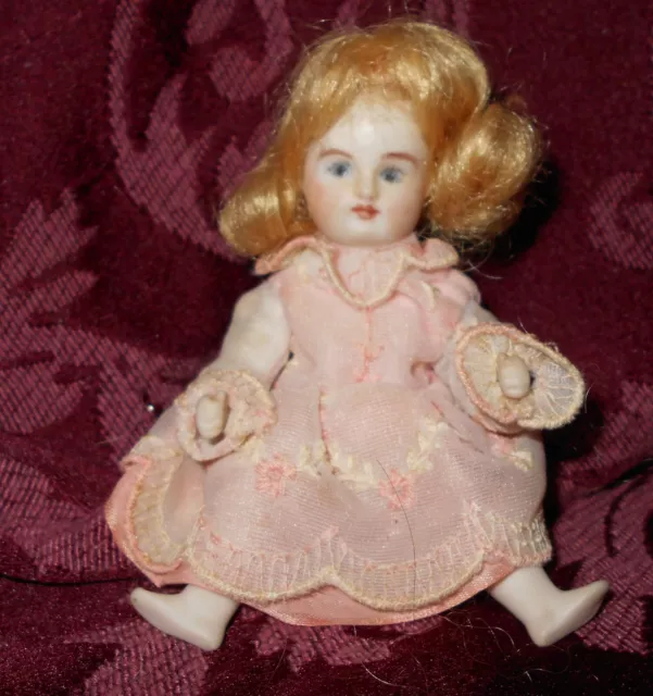 Tiny ALL BISQUE doll ~ 5" ~ Dressed in Peach ~ Fine painting ~Jointed arms, legs