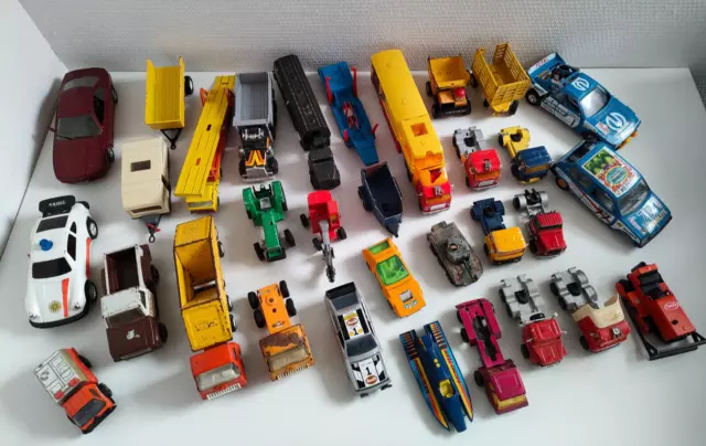 Lot de voitures et camions marques Tonka Majorette Matchbox etc