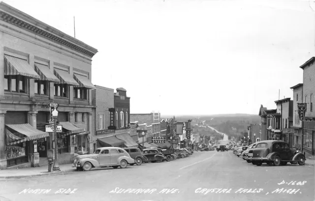 J68/ Crystal Falls Michigan RPPC Postcard c40-50s North Side Stores 75
