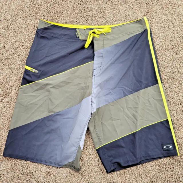 Oakley Board Shorts Mens 38 Yellow Black Striped Swim Trunks Modern Cargo Pocket