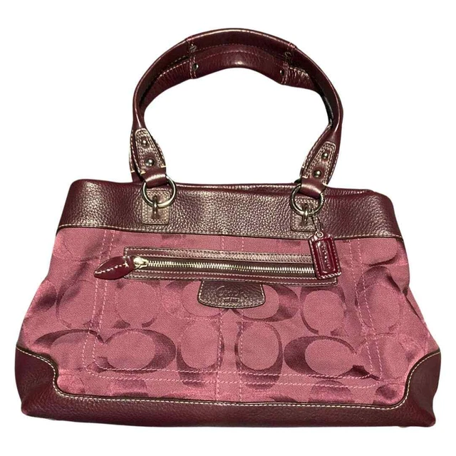 Coach purse sales with purple trim
