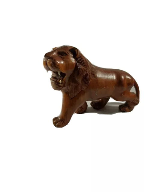 Carved Wood Lion With Ivory Teeth