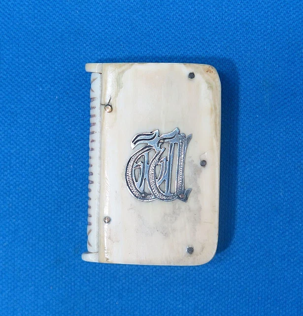 Match safe, book shape with sterling letters on bone, double opening, c. 1895 Match safe, book shape with sterling letters on bone, double opening, c. 1895