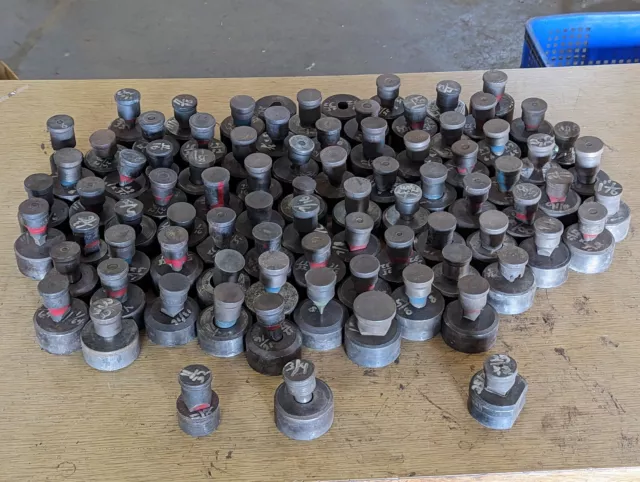 Lot of 100+ punch press dies: round, oval, square, roughly 5/8" to 1-1/8"