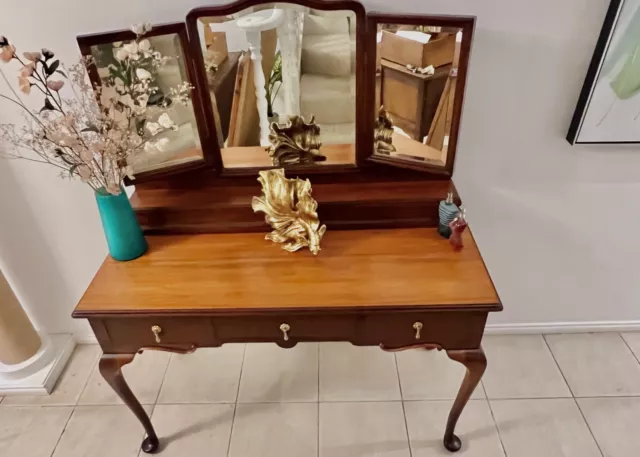 Antique 1920’s Queen Ann mahogany dresser with 3 Winged mirrors.