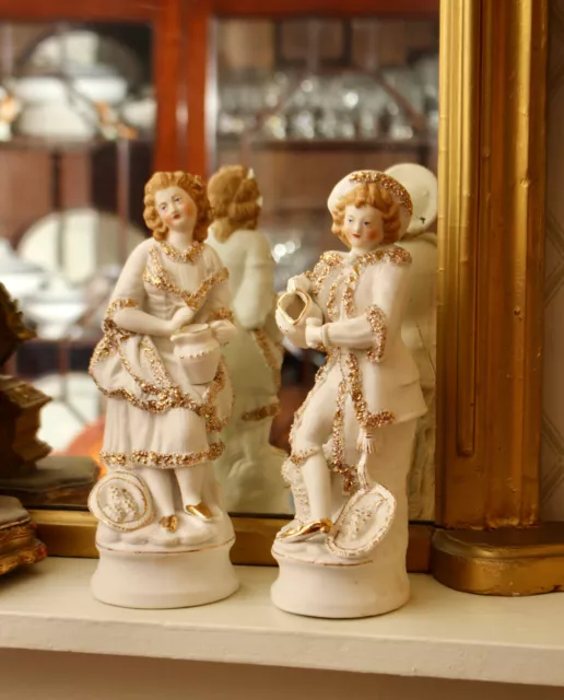 A Pretty Pair of c19th Bisque Figures, with Painted Faces and Copious Gilding