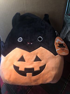 emily in a pumpkin squishmallow