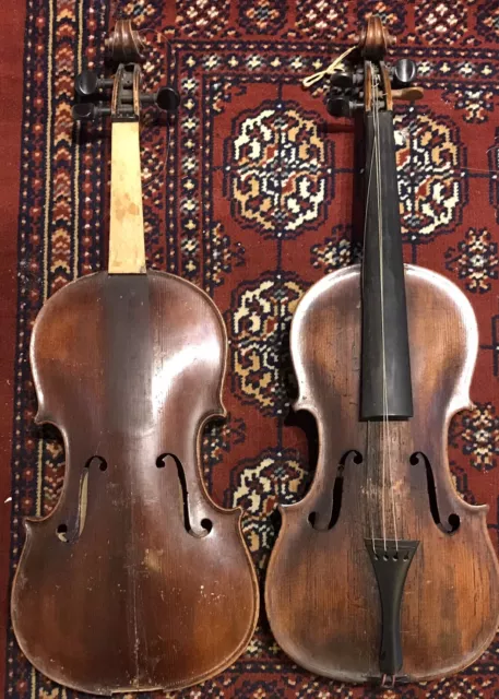 Old violins (2) for decoration or repair