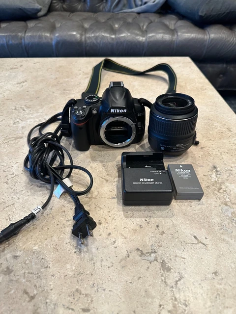 Nikon D3000 10.2MP Digital SLR Camera w/ AF-S Nikkor 18-55 & 18-200mm Lens
