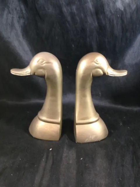 Sold at Auction: 2 PAIR BRASS DUCK HEAD BOOKENDS