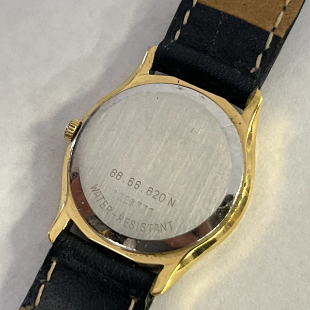 Donna Movado quadrante nero finiture oro 88-66-820N, usata batteria nuova MV66 6