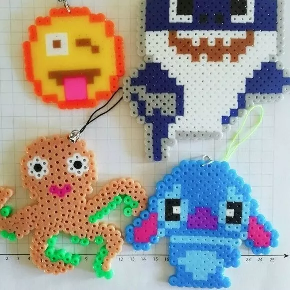 https://www.picclickimg.com/bgQAAOSwoF1kdJw9/Handmade-Perler-Bead-Keychains-Assorted-Design.webp