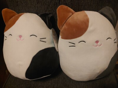 stuffed kittens in a basket