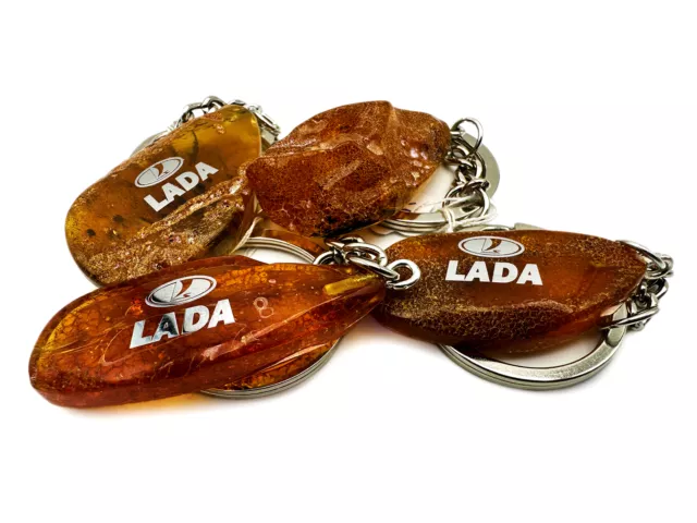 Naturbernstein Schlüsselanhänger Lada Logo silber natur braun "Pascha"