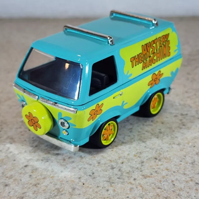 https://www.picclickimg.com/biAAAOSwNopk77oU/Jada-Toys-Scooby-Doo-The-Mystery-Machine-1-32.webp