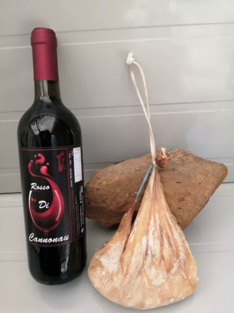 Un caglio di capretto o agnello (Su Callu) - Una bottiglia di Vino da 75cl