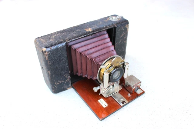 1905 Vintage Antiguo 4x5? Cámara de película de rollo plegable de madera de caoba Blair Wollensak