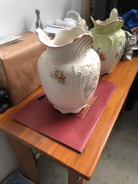 2 antique water jugs