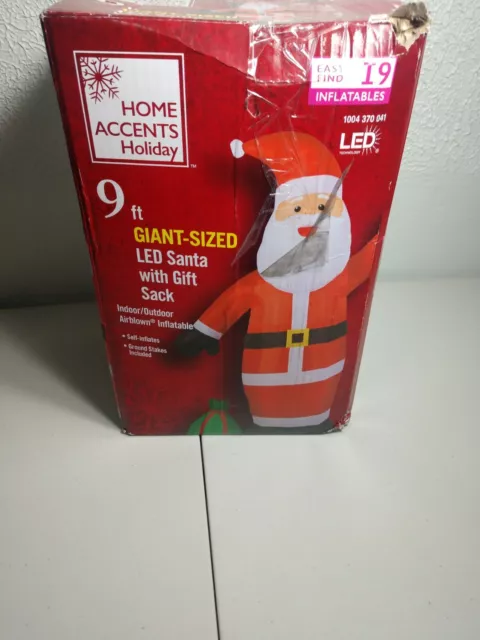 Home Accents Holiday 9 ft. Pre-Lit Inflatable Santa with Bag Airblown