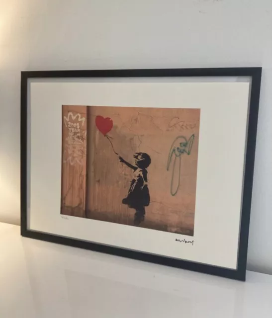 lithographie banksy avec certificat et encadrée