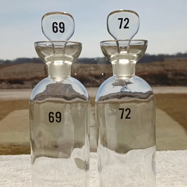 2 TCW Co Apothecary Bottles Ground Glass Stoppers Numbers 69 & 72 T.C.W. Co.