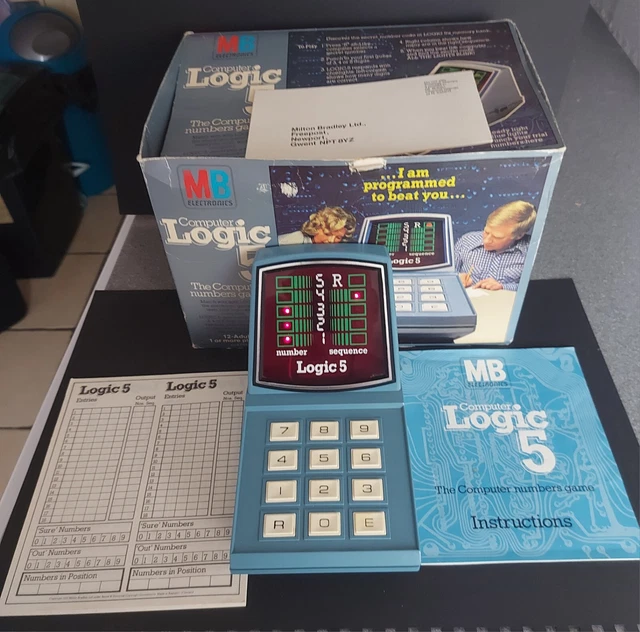 A collection of vintage toys and games including, a Computer Logic 5