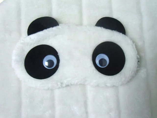 Masque de sommeil nuit repos peluche tête de panda blanche yeux mobiles original