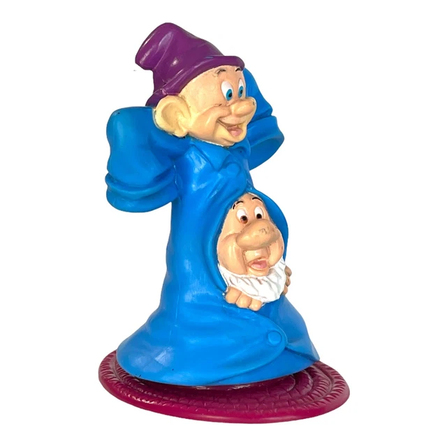 Disneys Snow White And The Seven Dwarfs Dopey And Sneezy Spinning Cake
