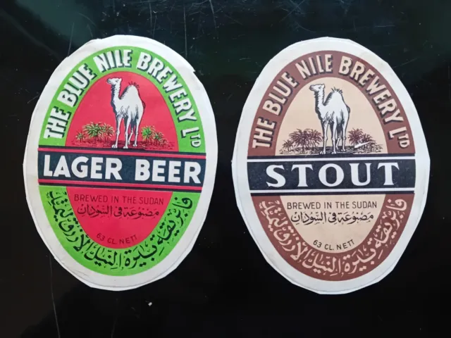 2 Beer Labels THE BLUE NILE BREWERY LTD. Brewed In Sudan LAGER BEER & STOUT