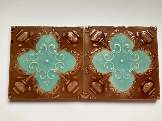 A pair of antique Victorian fireplace tiles, brown and turquoise, 15x15 cm.