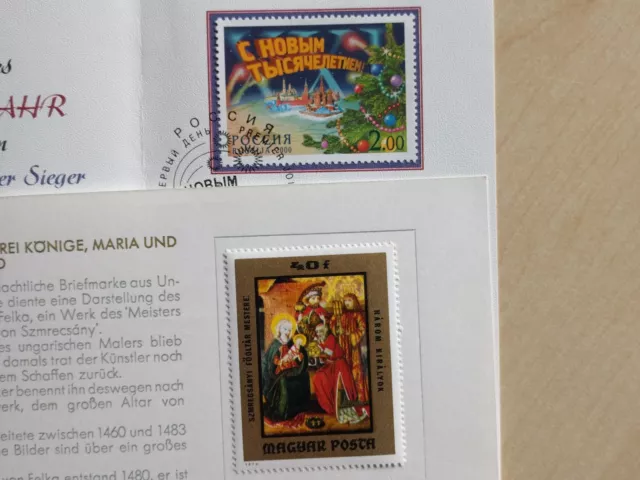 2 Weihnachtsmarken im Schmuck - Folder Ungarn + Russland Weihnachten